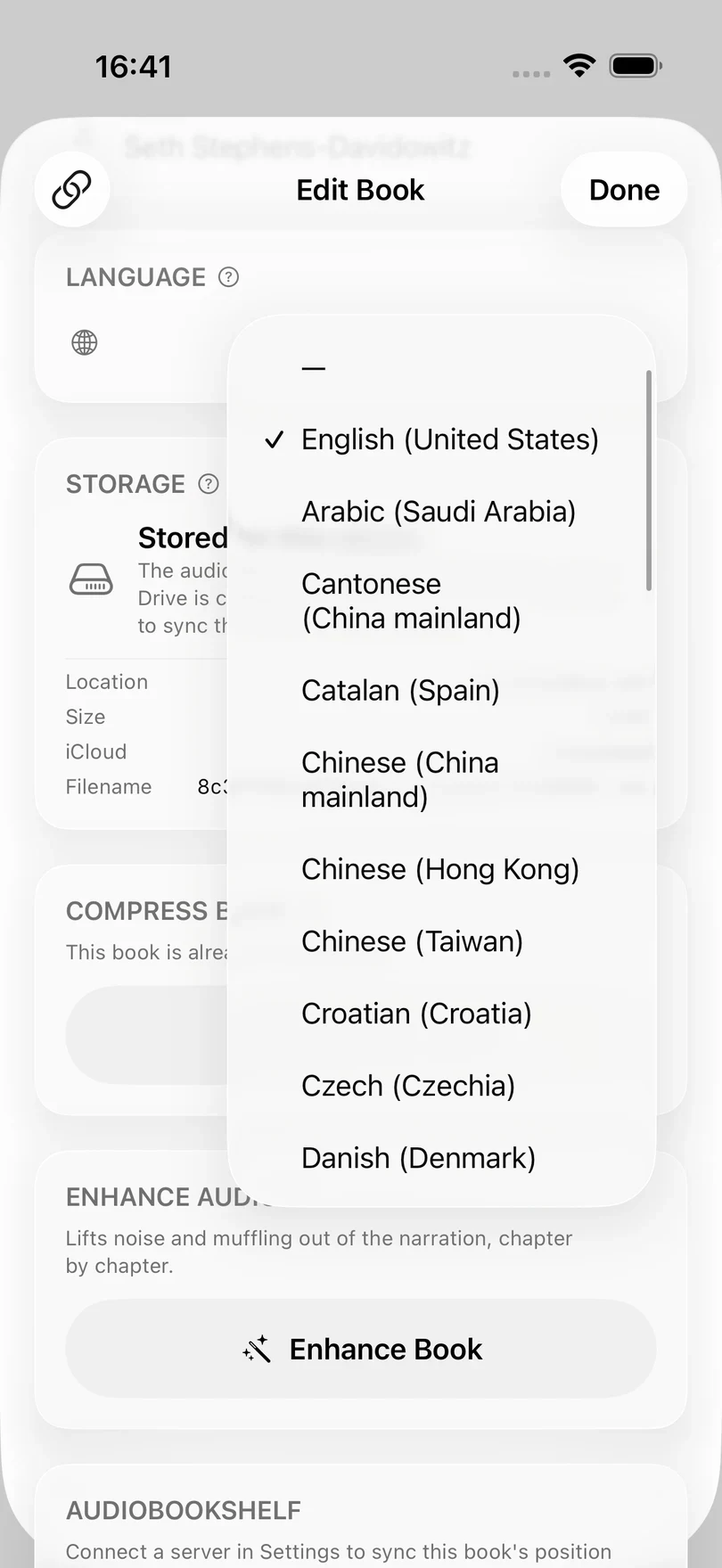 The Book Language menu open in Edit Book, with English (United States) ticked above a list of other languages.